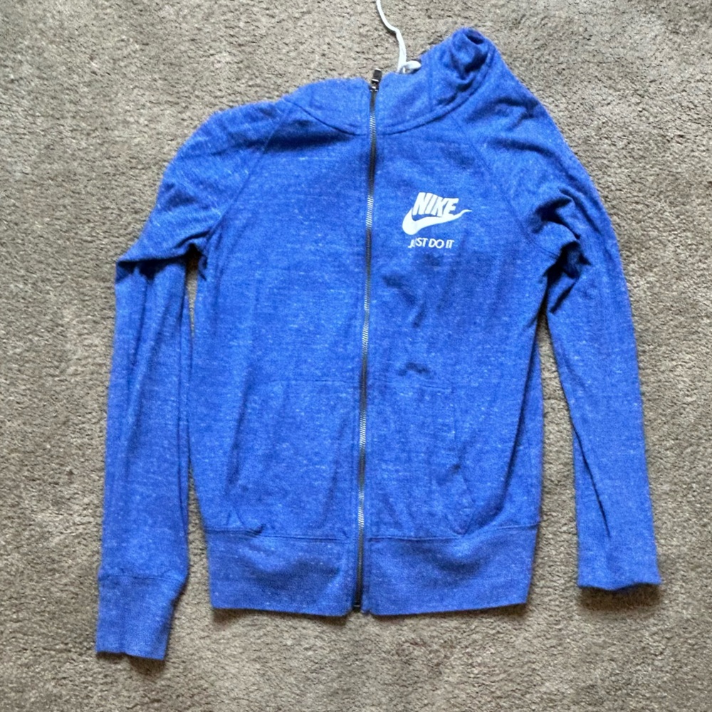 Blue zip up Nike sweatshirt